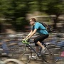 person riding bike on davis campus